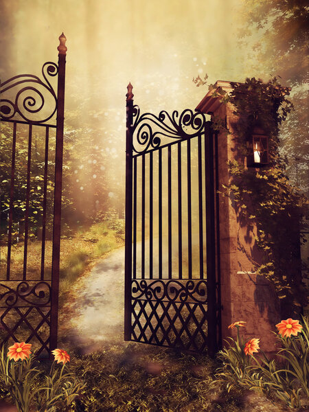 Vintage gate to an autumn garden with trees and flowers