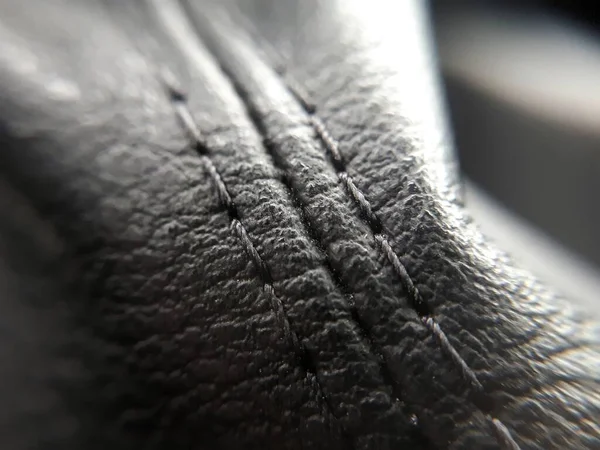 Seam on leather product (close up)