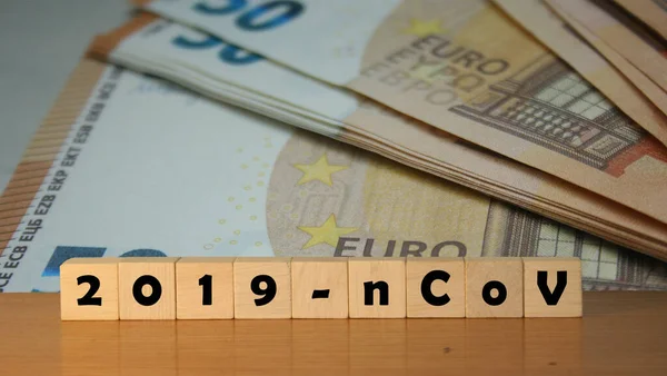 Coronavirus Covid Notas Euro Segundo Plano Blocos Madeira Com Inscrição — Fotografia de Stock