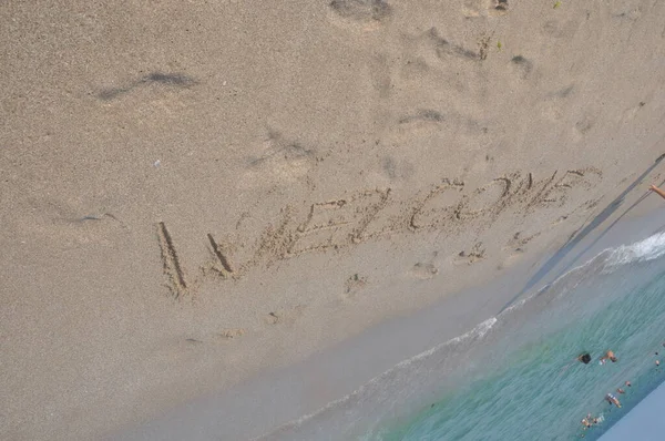 Inscription Sand Welcome — Stock Photo, Image