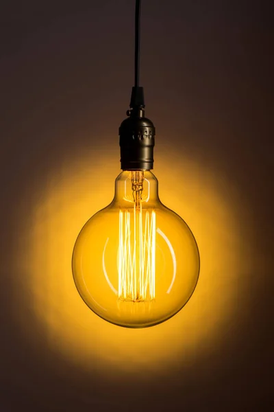 Retro Gloeilamp Van Edison Een Helder Oranje Achtergrond Opgenomen — Stockfoto