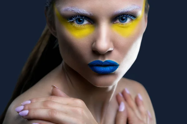 Portrait of a woman in fancy makeup — Stock Photo, Image