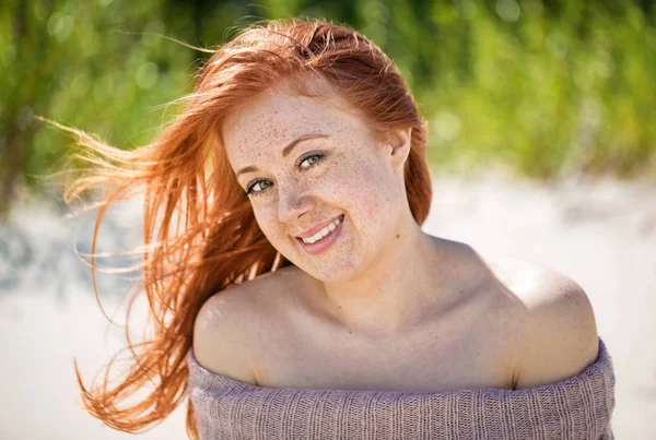 Portrait of a freckled redhead girl — Stock Photo, Image