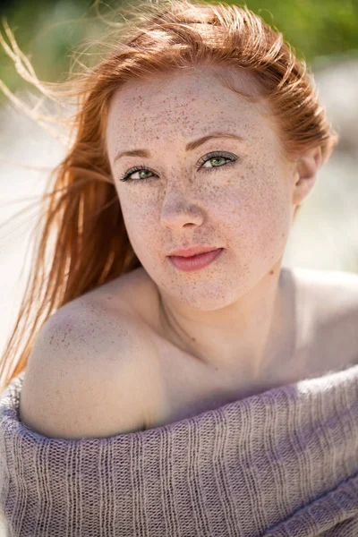 Portrait of a freckled redhead girl — Stock Photo, Image