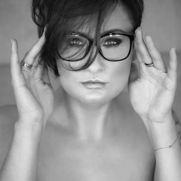 Woman's face with glasses close up — Stock Photo, Image