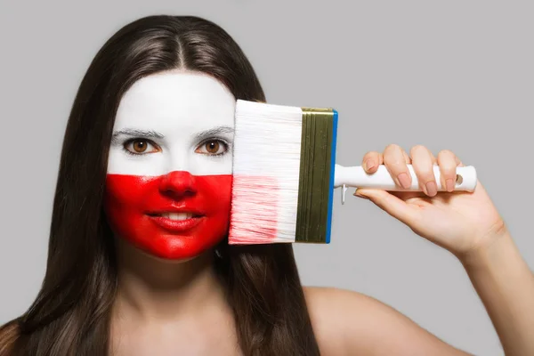 Apoiante feminino em cores nacionais da Polônia — Fotografia de Stock