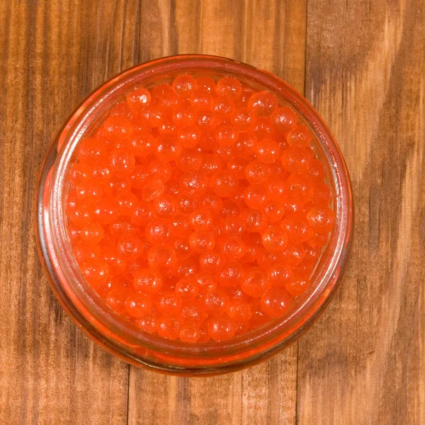 Image of banks with red caviar close-up — Stock Photo, Image