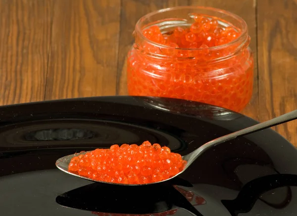 Isolated image of red caviar on a white background close up — Stock Photo, Image