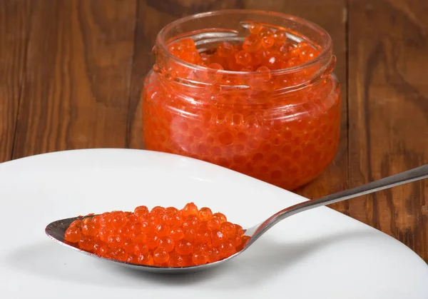 Isolated image of red caviar on a white background close up — Stock Photo, Image
