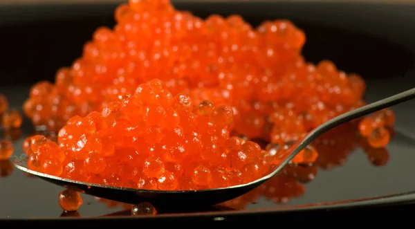 Isolated image of red caviar on a white background close up — Stock Photo, Image