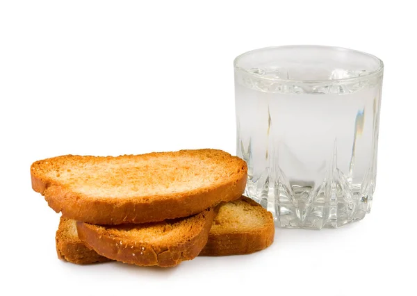 Crackers and glass of water — Stock Photo, Image