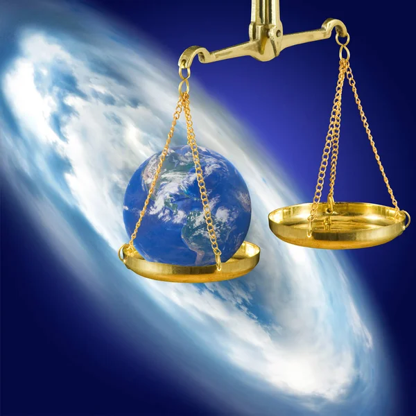 Stylized image of the globe on the scales — Stock Photo, Image