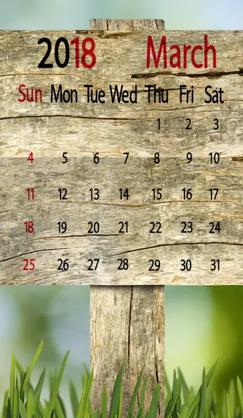 Kalender voor 2018 maart op houten plank achtergrond — Stockfoto