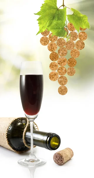 Glass with wine and bottle of wine — Stock Photo, Image