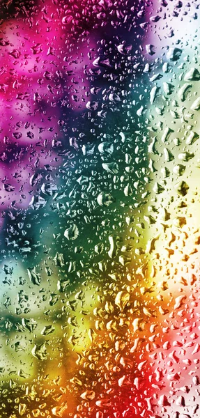 Gotas de lluvia sobre vidrio, fondo abstracto — Foto de Stock