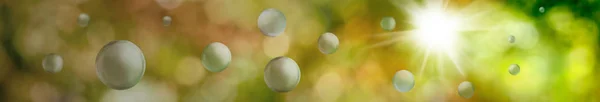 Boules stylisées vertes sur un beau bac naturel abstrait flou — Photo