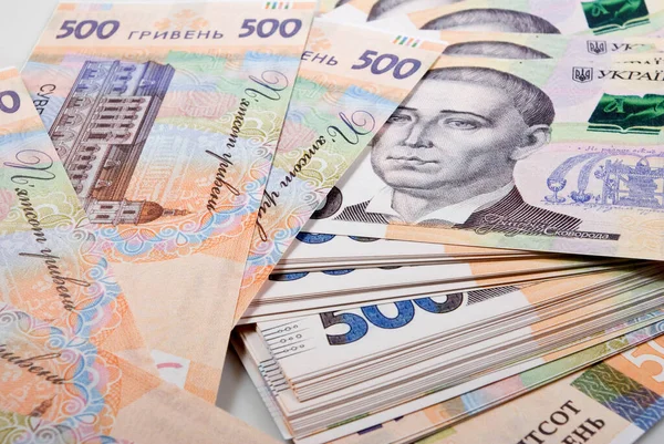 Oekraïense bankbiljetten verspreid in een puinhoop — Stockfoto