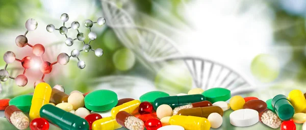 Conjunto de pastillas en el fondo de una cadena de ADN — Foto de Stock