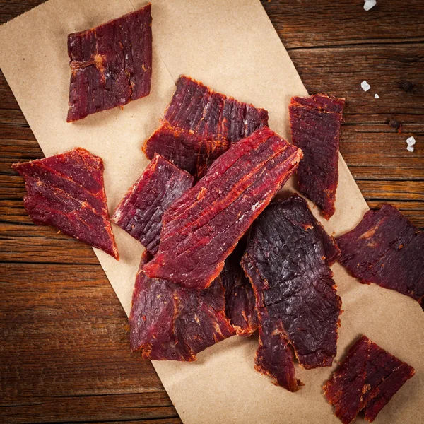 Delicious Homemade Beef Jerky Background. Selective focus.