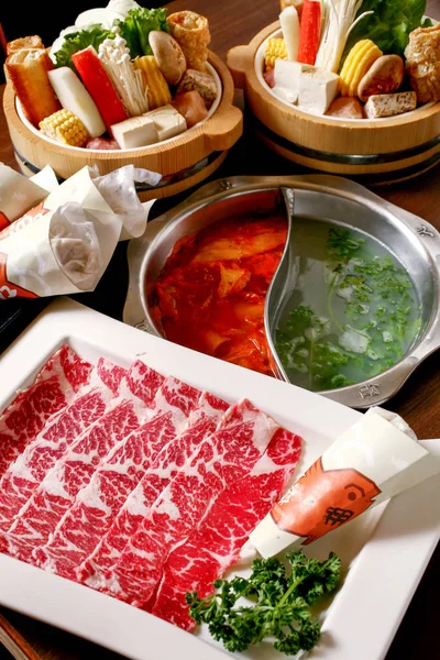 Double flavor hot pot with beef and vegetable set — Stock Photo, Image