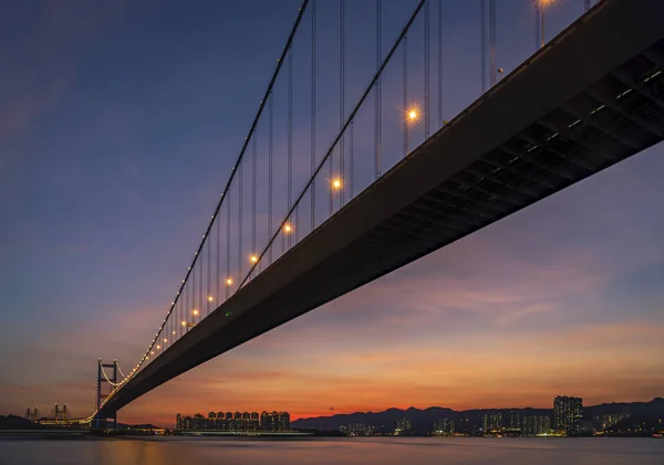 Sunset under the Tsing Ma Bridge of Hong Kong. — Stock Photo, Image