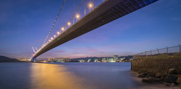 Sunset under the Tsing Ma Bridge of Hong Kong. — Stock Photo, Image