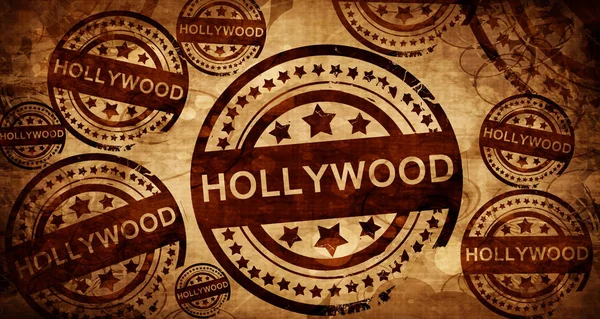 Hollywood, sello vintage sobre fondo de papel — Foto de Stock