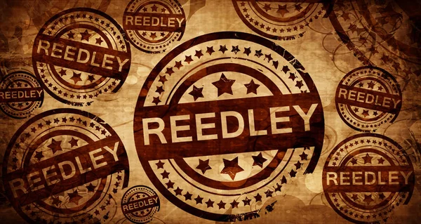 Reedley, kağıt arka plan üzerinde vintage damgası — Stok fotoğraf