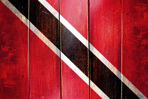 Vintage vlajka Trinidad a tobago na grunge dřevěný panel — Stock fotografie