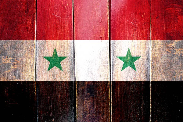 Vintage Syria  flag on grunge wooden panel — Stock Photo, Image