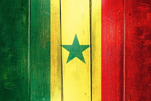 Bandeira vintage do Senegal no painel de madeira grunge — Fotografia de Stock