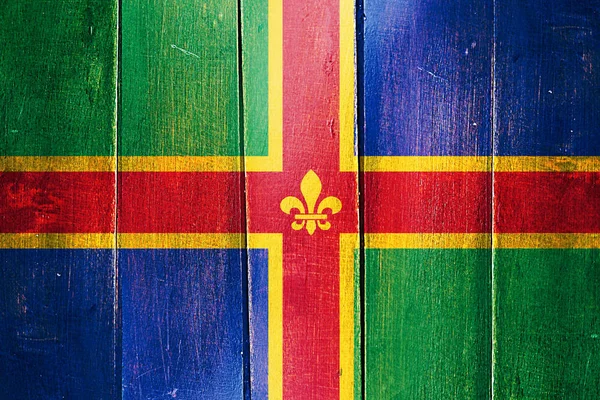 Vintage Lincolnshire Flagge auf Grunge Holzplatte — Stockfoto