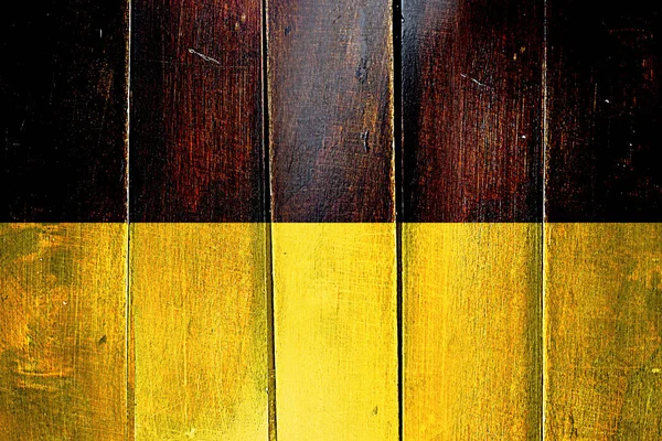 Vintage vlajka Baden Wurttemberg na grunge dřevěný panel — Stock fotografie