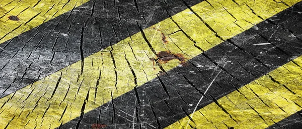 Černé a žluté varovné pruhy — Stock fotografie