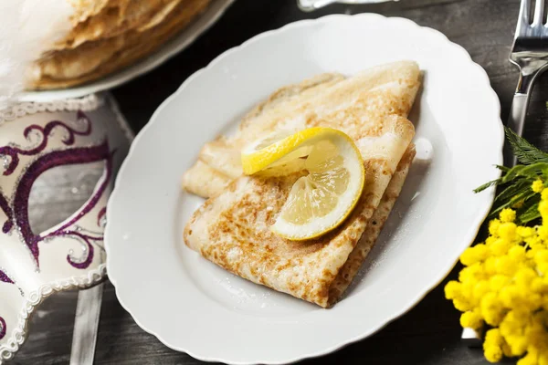 English-style pancakes with lemon and sugar, traditional for Shrove Tuesday