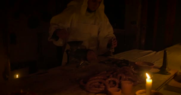 Two butchers cutting meat in an old grocery — Stock Video