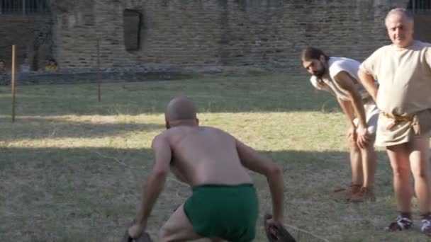 Ancient Roman Pentathlon Athlete Jumping Slow Motion Reenactment Back Time — Stock Video