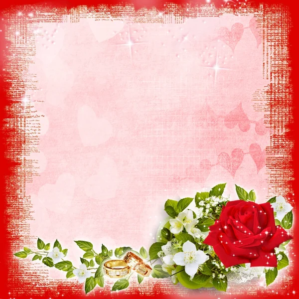 A solemn wedding card with flowers, rings, ribbons. Beautiful wedding background with flowers, wedding rings, ribbons and a free place for your editing. Perfect for wedding invitations or congratulations.