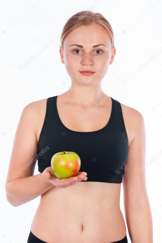 Girl with a green apple in her hand