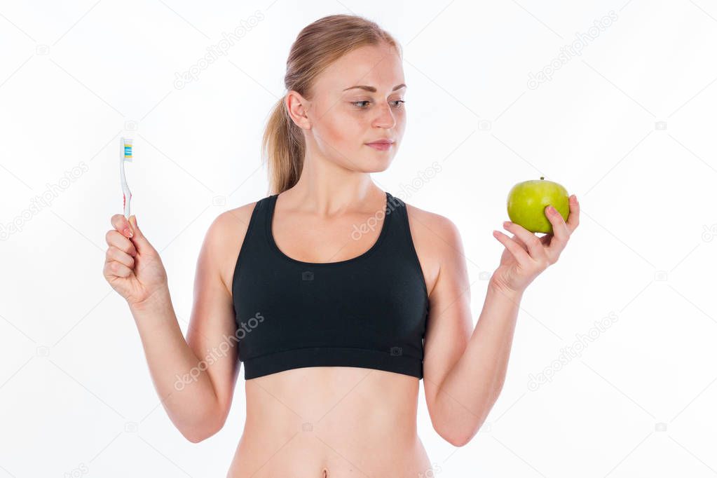 Girl with Green Apple and a toothbrush in his hand