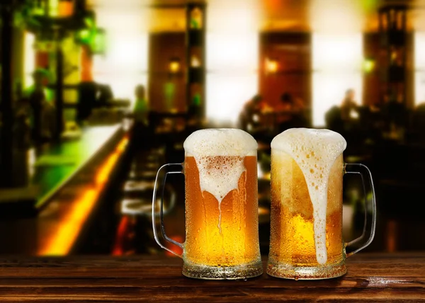 cold light beer glass mug in a pub