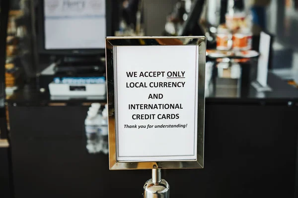 Card only and domestic cash at airport
