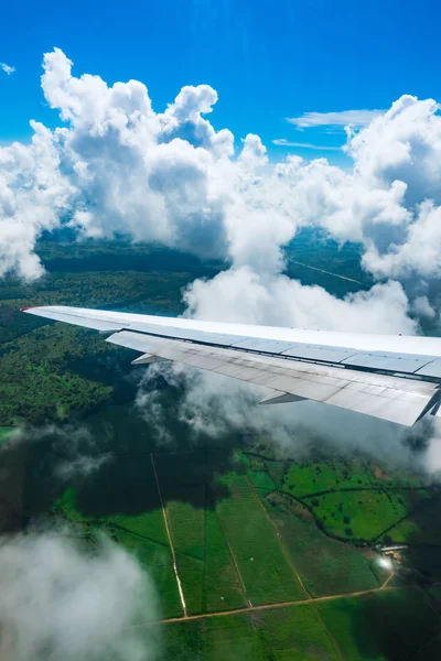 View of the wing of an airplane through the window — Stock Photo, Image
