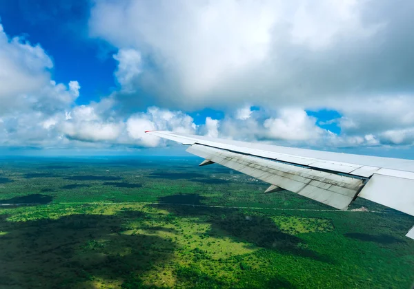 View of the wing of an airplane through the window — Stock Photo, Image