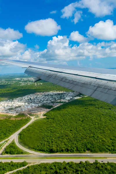 View of the wing of an airplane through the window — Stock Photo, Image