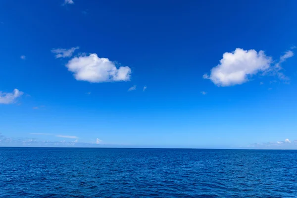 Open blue sea cumulus clouds — Stock Photo, Image