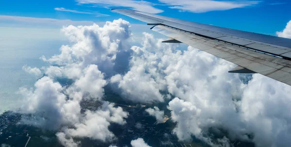 View of the wing of an airplane through the window — Stock Photo, Image