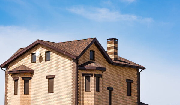 house with a gable roof window