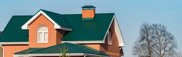 house with a gable roof window
