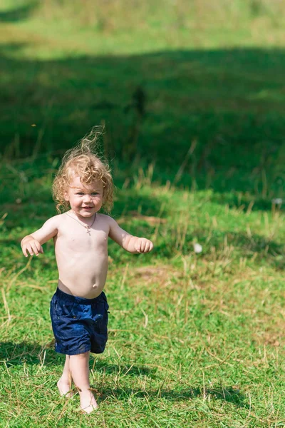 Blond curly-haired child — Stock Photo, Image